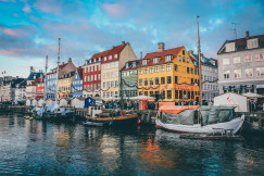 two-gray-and-black-boats-near-dock in Copenhagen