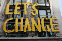  Street sign saying ‘Let’s Change’.  