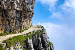 a-road-going-up-the-side-of-a-mountain