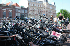 A bunch of bikes parked next to eachother