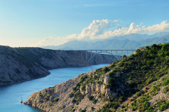 Gray bridge over the river. 