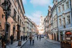 people-walking-on-street-between-buildings-during-daytime