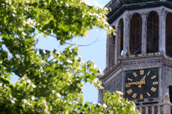 a-large-clock-tower-with-a-clock-on-each-of-its-sides