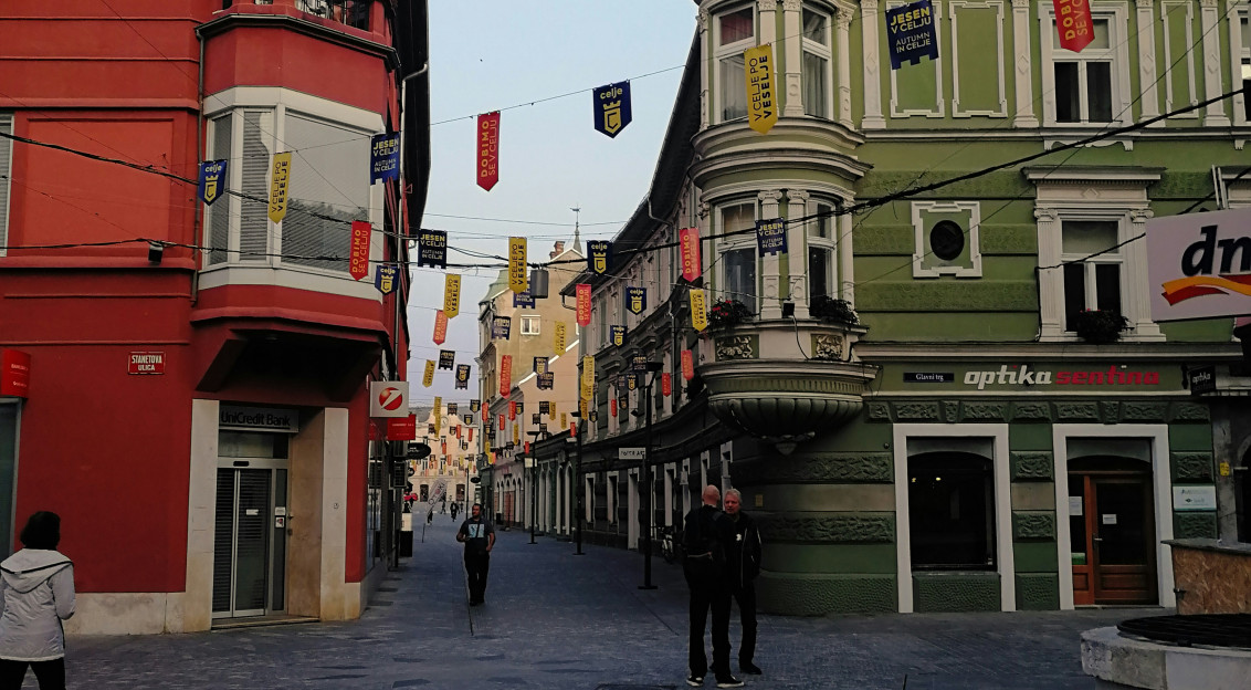 The picture describes a pedestrian street in the historic centre of Celje, Slovenia.