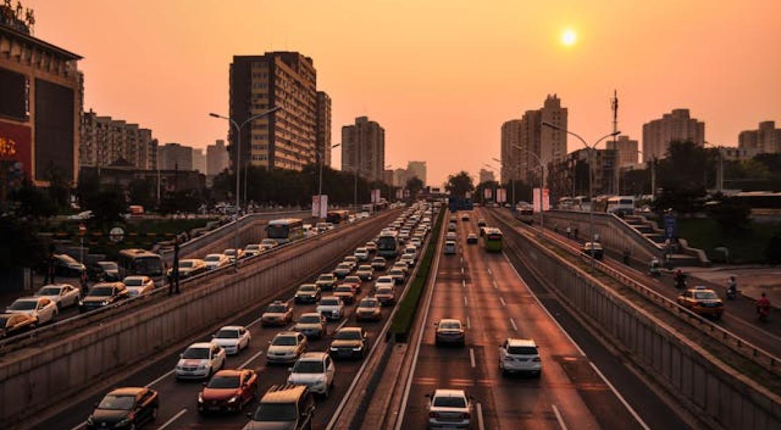 Photo by Pexels An illustrative photo of vehicle in road at golden hour.