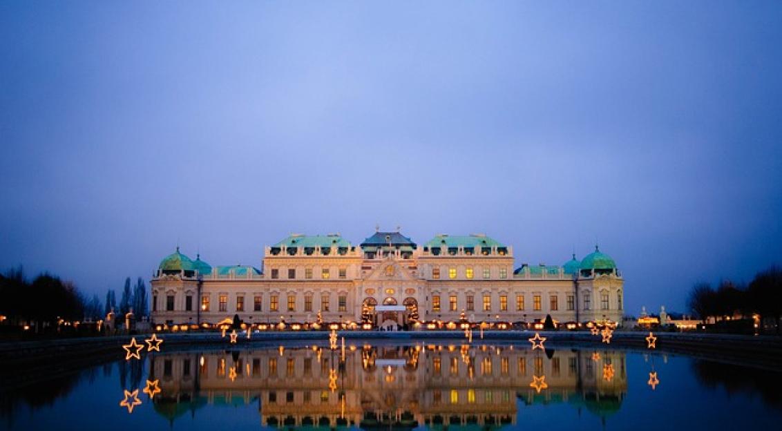 An illustrative photo of Belvedere palace in Vienna, Austria at night 
