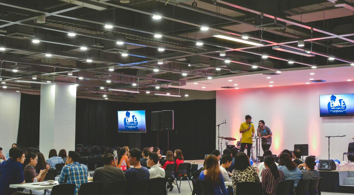 An illustrative photo of people attending a business event