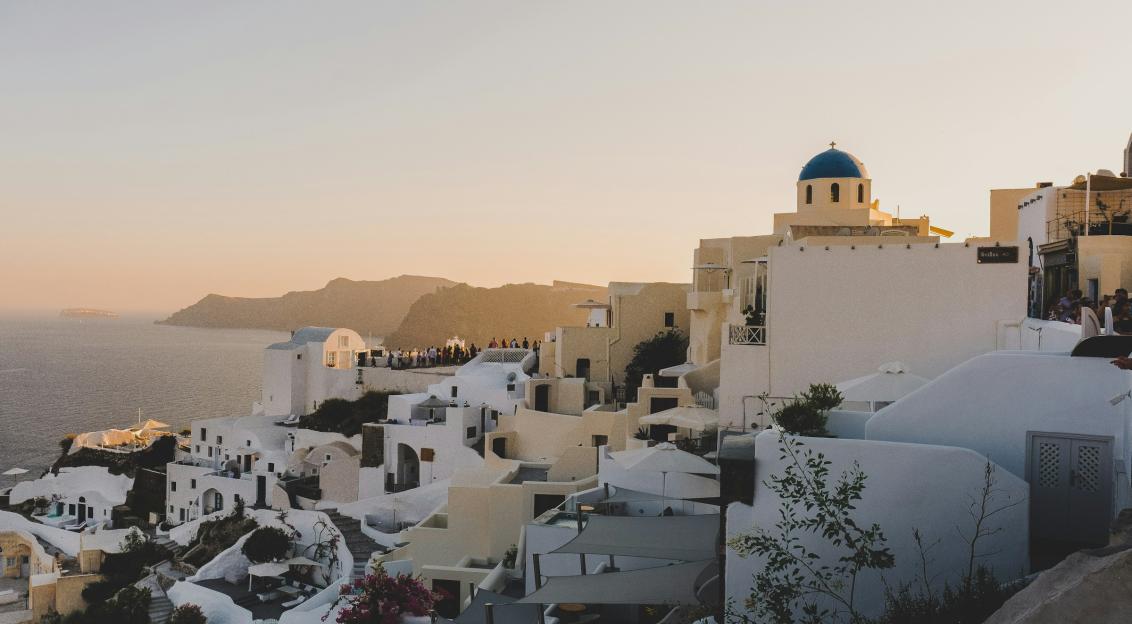 An illustrative photo of white houses.