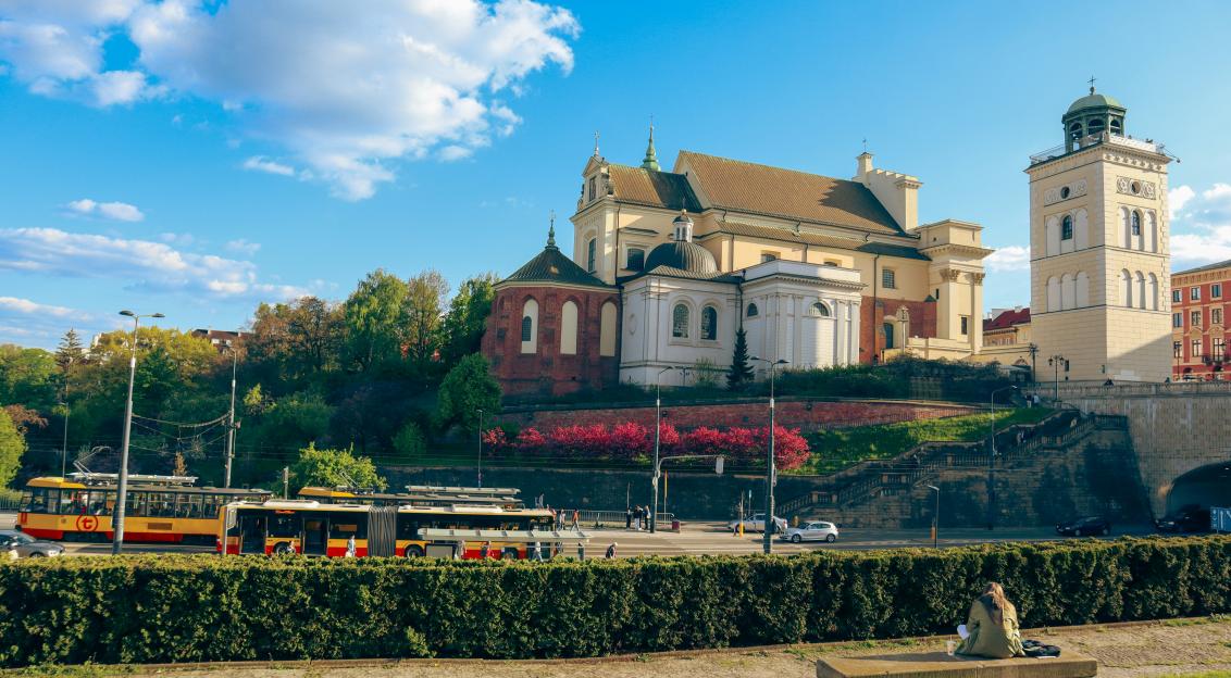 Photo by Unsplash An illustrative photo of a large white building with a clock tower on top of it