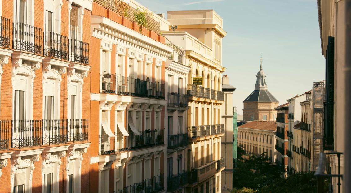 Photo by Unsplash An illustrative photo of a view of a building with a clock tower in the distance
