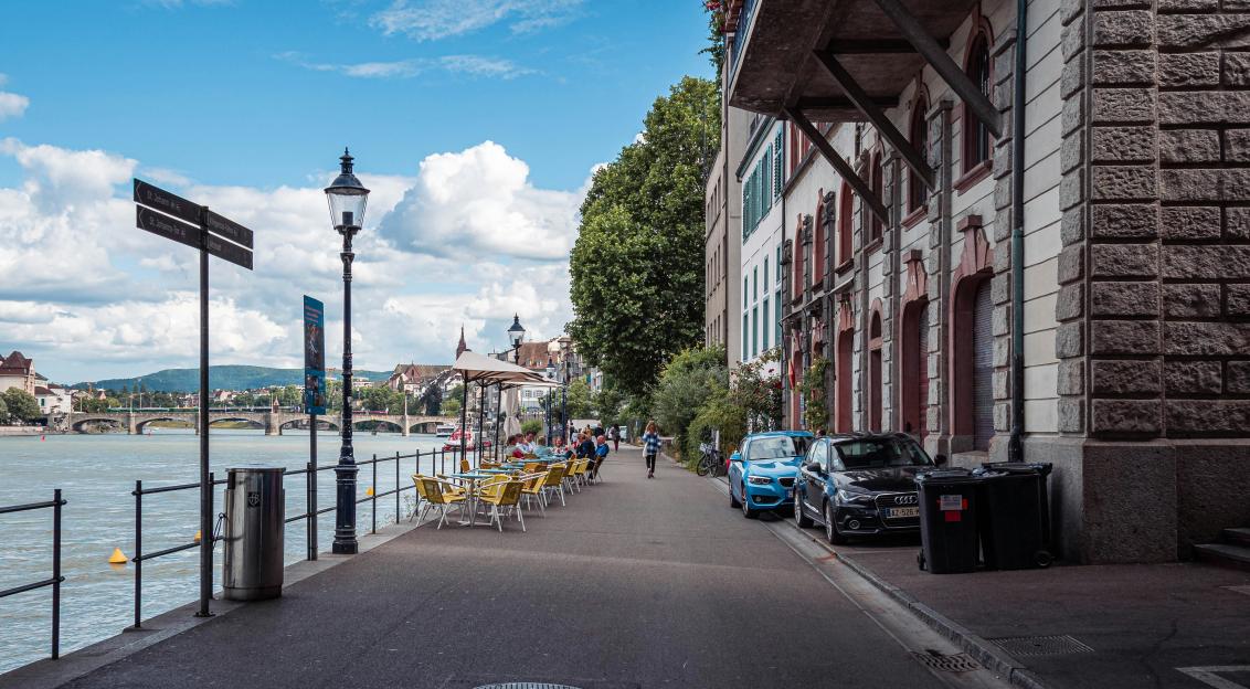 An illustrative photo of a street with cars.