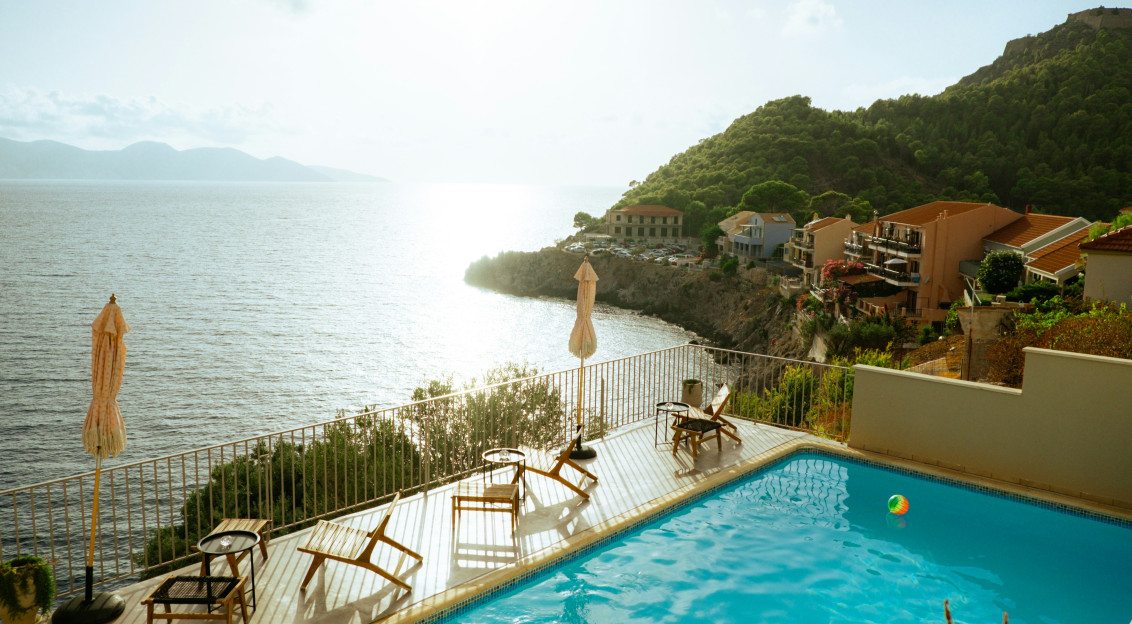 Photo by Unsplash An illustrative photo of a large swimming pool next to the ocean