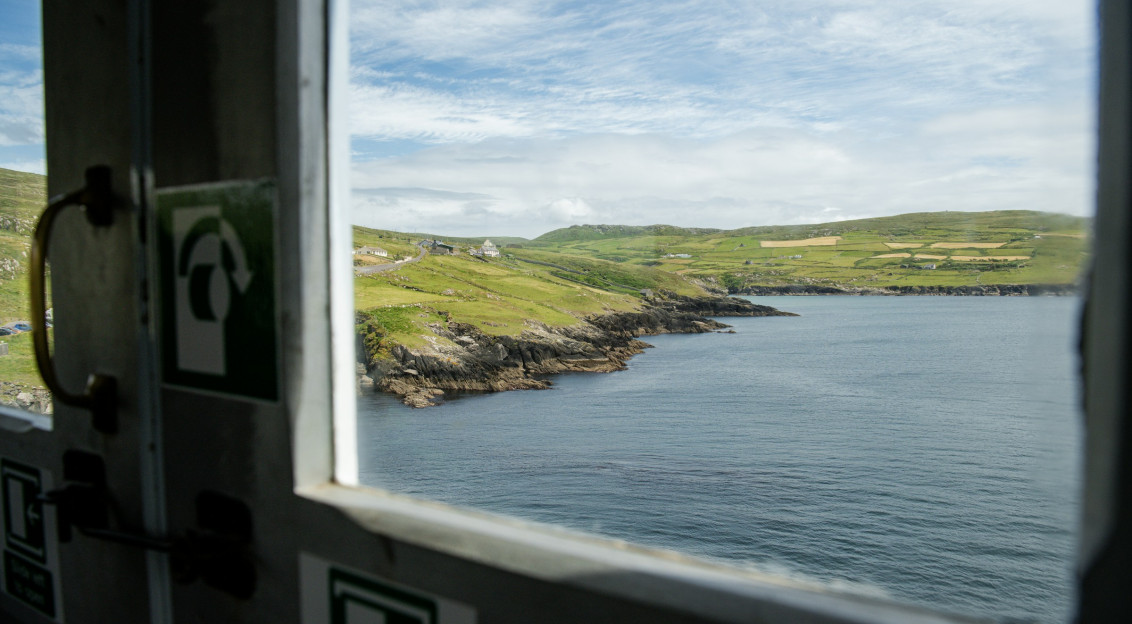 Photo by Unsplash An illustrative photo of a view of a body of water through a window.