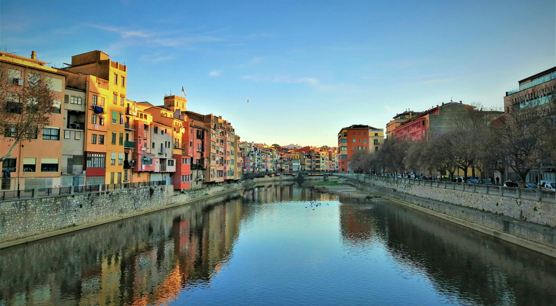 Photo by Unsplash An illustrative photo of colorful buildings near a body of water