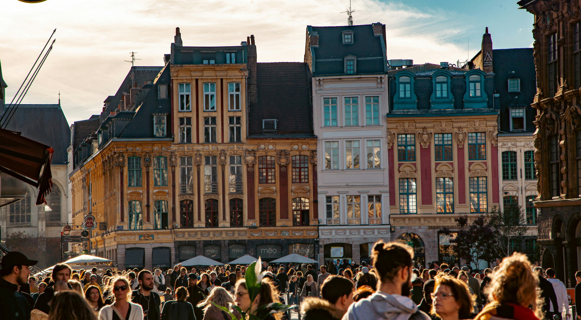 An illustrative photo of people walking in a city