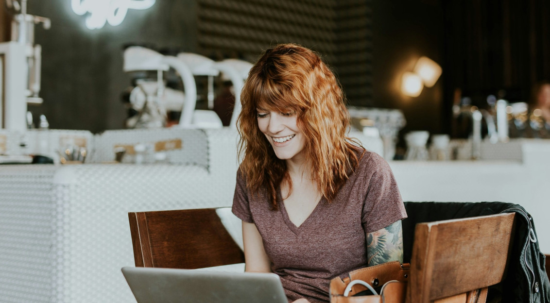 Photo by Unsplash An illustrative photo of a woman with a laptop.