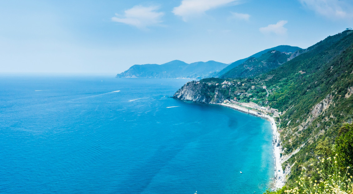 Image by Unsplash An illustrative photo of the mountains near the ocean.
