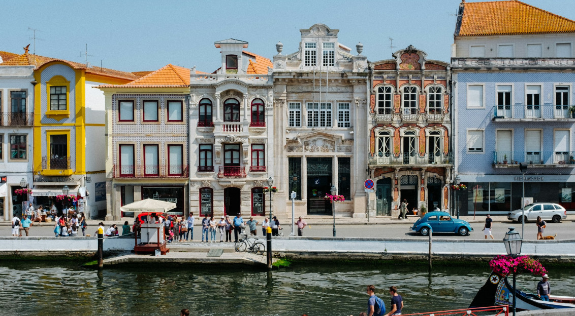 Photo by Unsplash An illustrative photo of group of people beside water.