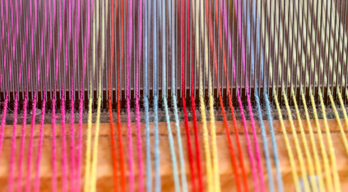 A close up of a colorful weaving machine – Free Image on Unsplash