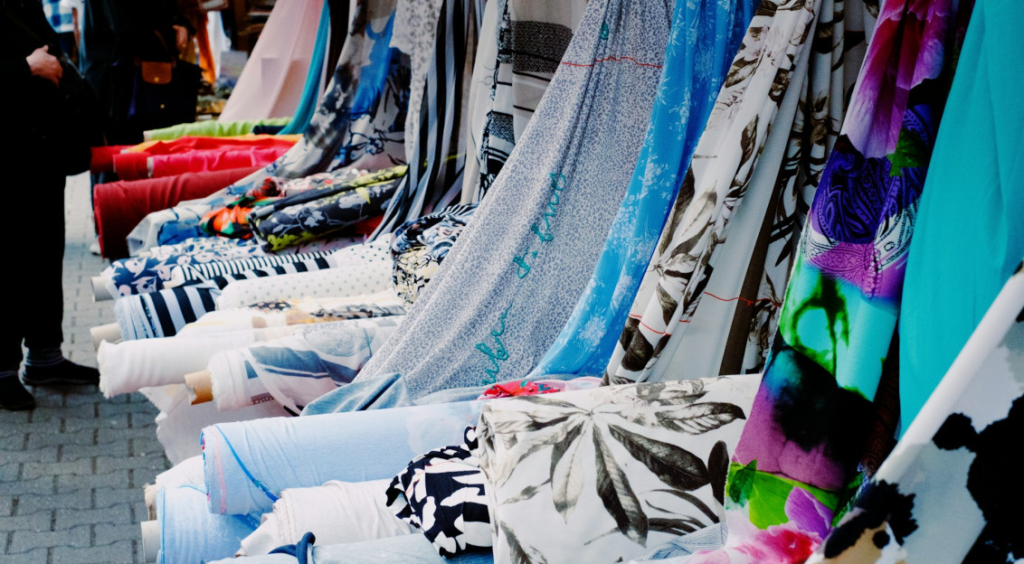 A row of colorful scarves on display on a sidewalk photo – Free Woman Image on Unsplash A row of colorful scarves on display on a sidewalk photo – Free Woman Image on Unsplash