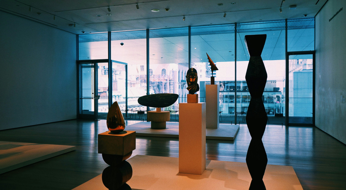 An illustrative photo of a room filled with different types of sculptures.