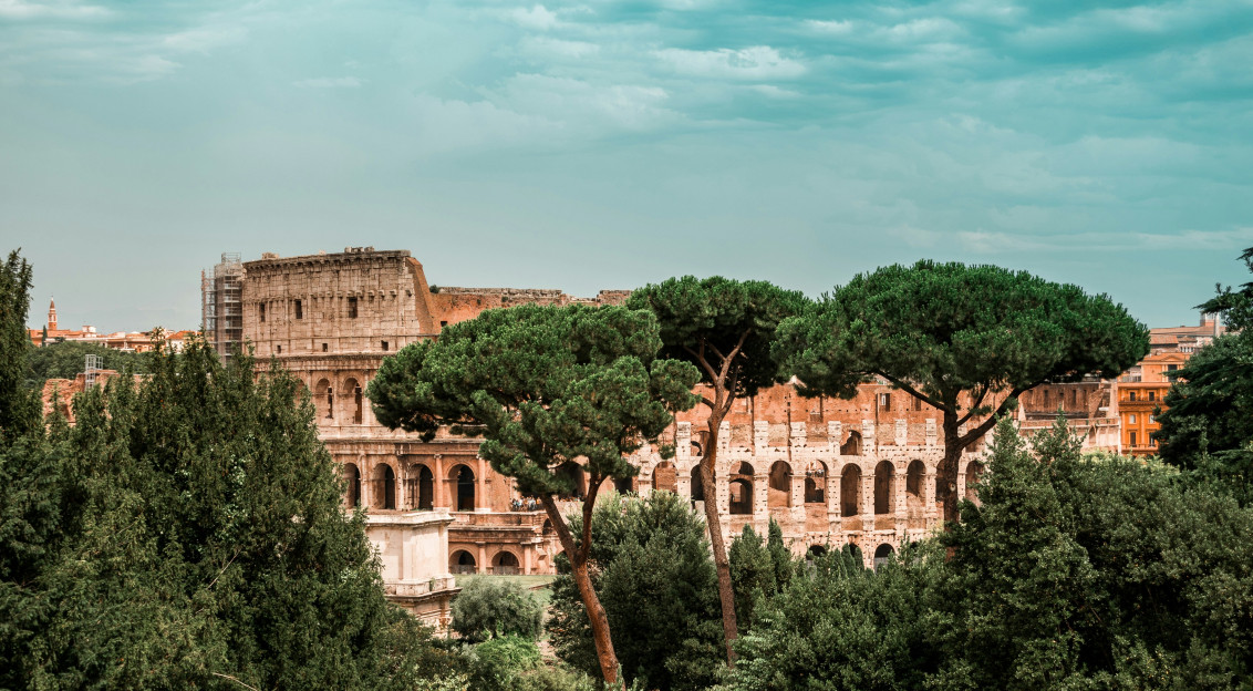 Photo by Unsplash An illustrative photo of an ancient building near green trees.