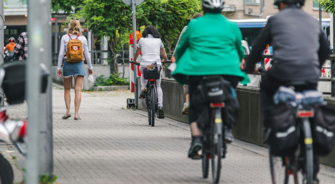 Photo by Unsplash An illustrative photo of people on bicycles.