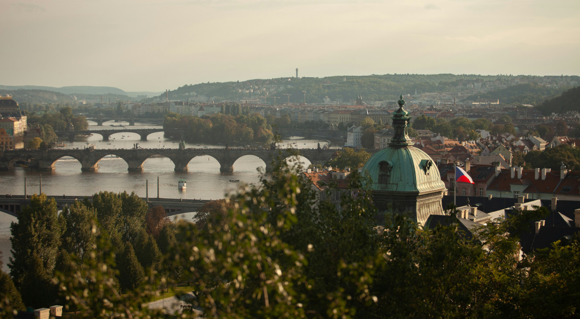 An illustrative photo of a view of a bridge over a river.