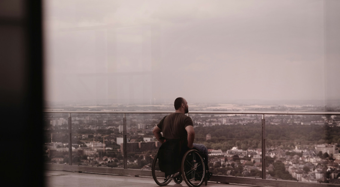 An illustrative photo of a person in a wheelchair.