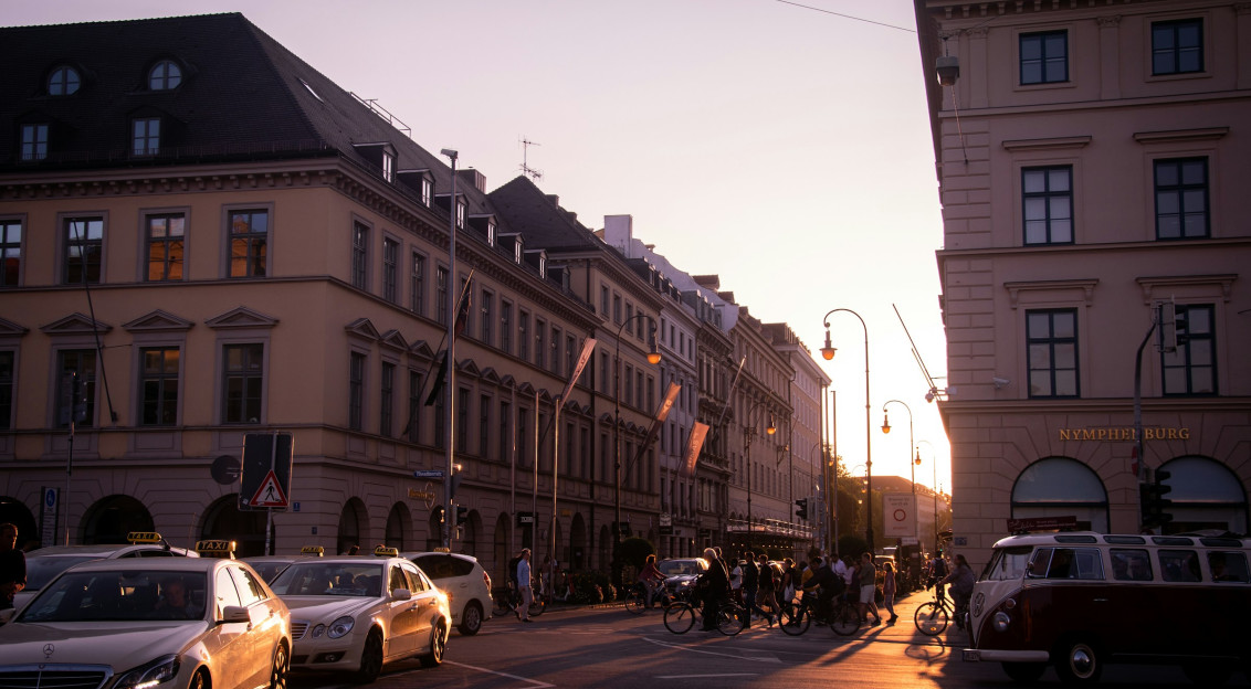 Photo by Unsplash An illustrative photo of cars parked outside buildings.