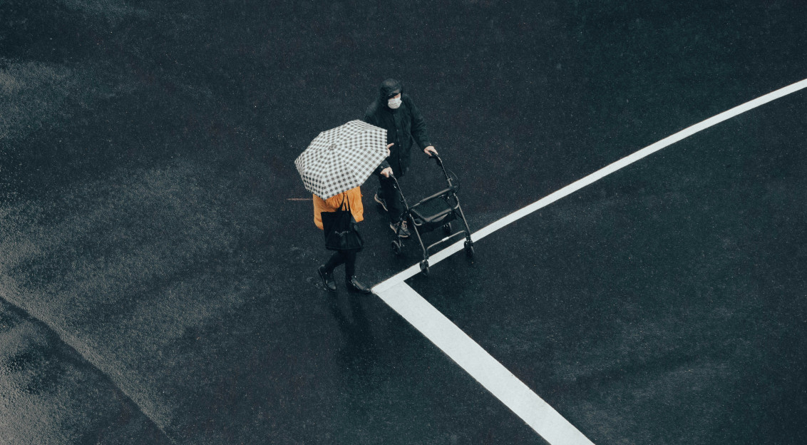An illustrative photo of people walking.