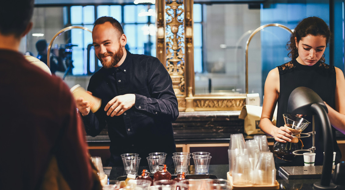 Photo by Unsplash An illustrative photo of man and woman mixing beverages.