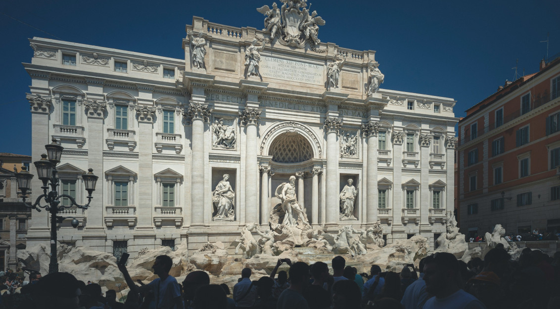 Photo by Unsplash An illustrative photo of the Trevi Fountain in Rome, surrounded by tourists.