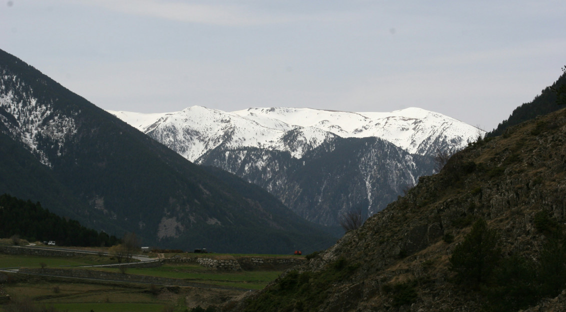 Photo by Unsplash An illustrative photo of a valley with mountains in the background.