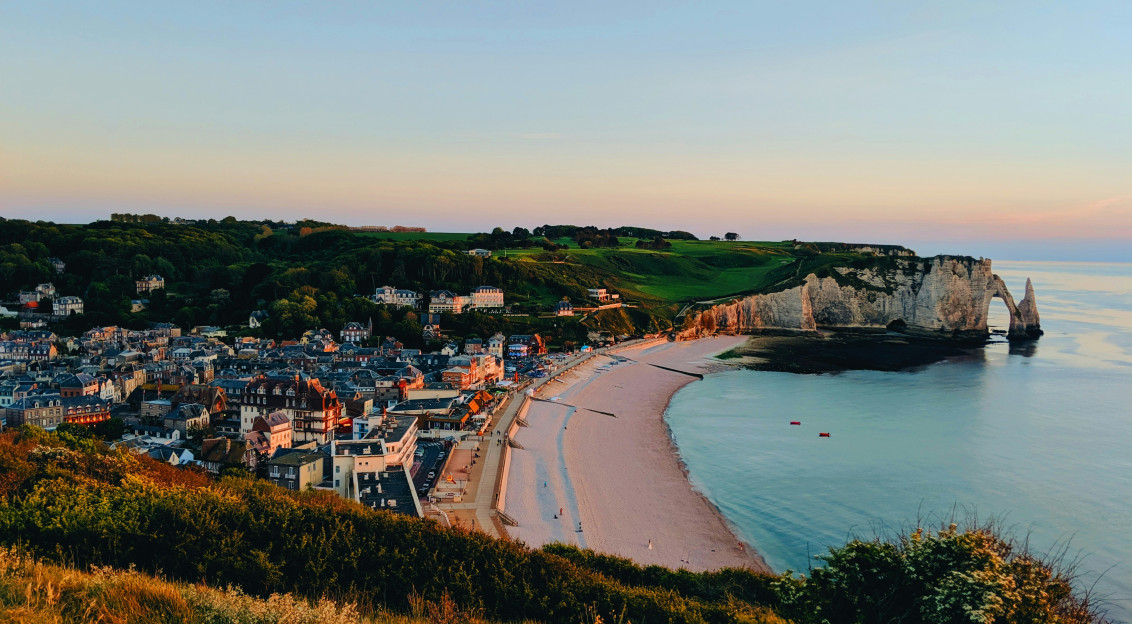 Photo by Unsplash An illustrative photo of buildings on a coast near a body of water.