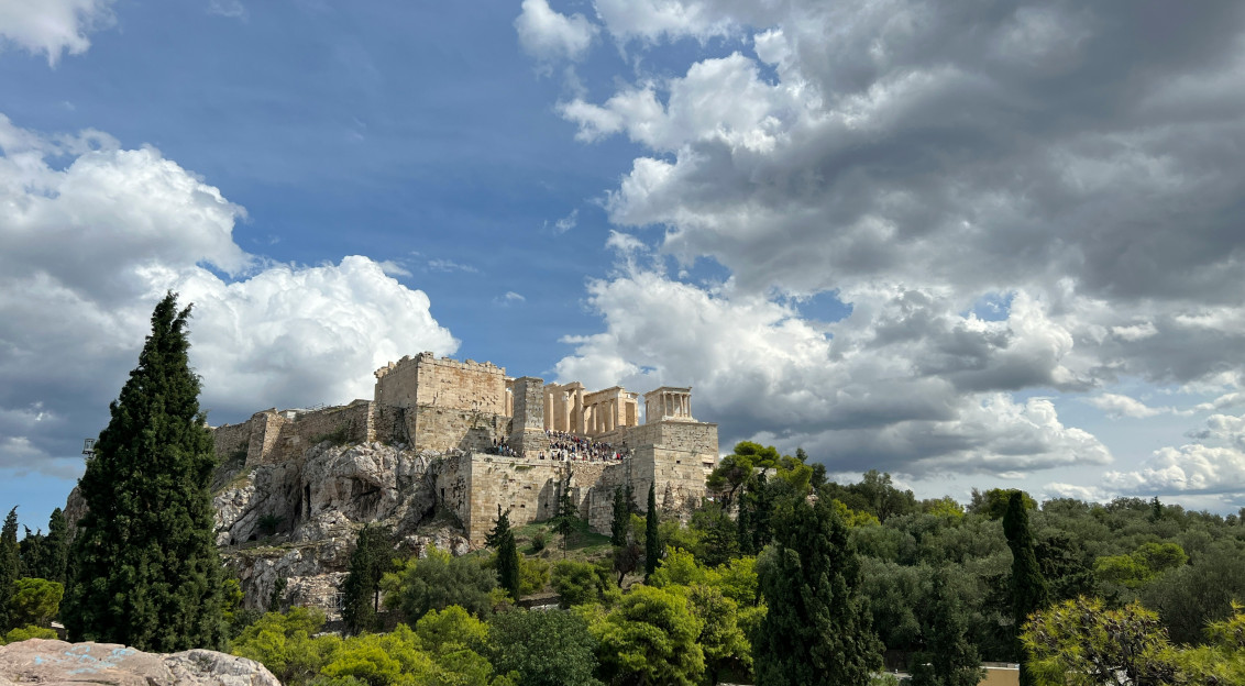 An illustrative photo of a stone castle on a hill.